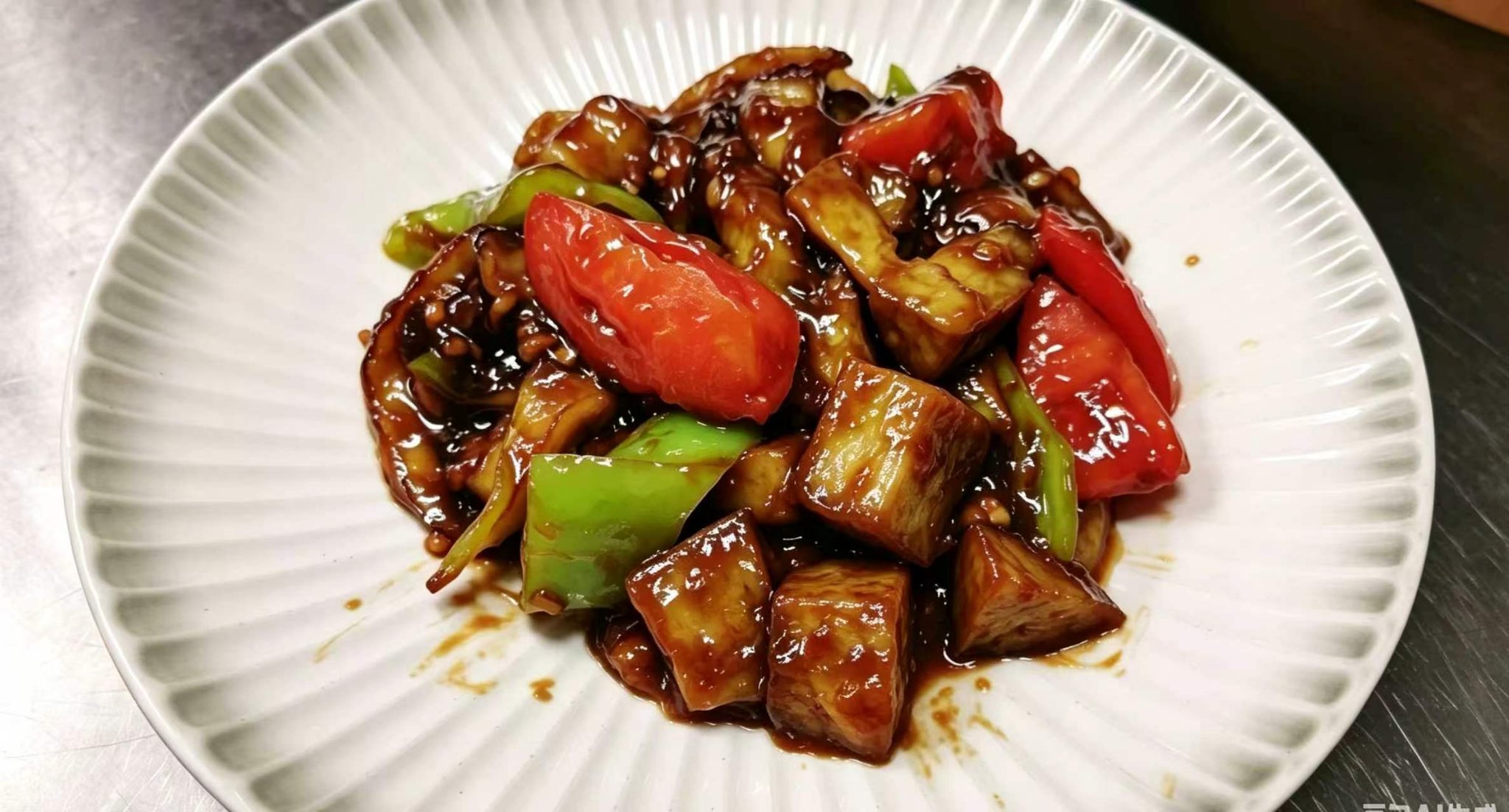Geschmorte Auberginen mit Tomaten und Paprika