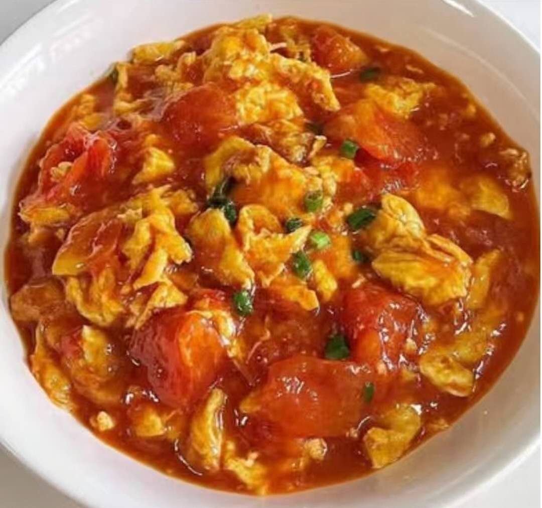 Chinesische gebratene Tomaten-Rührei